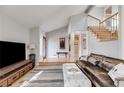 Comfortable living room with vaulted ceilings and a staircase at 3261 Turtle Lake Se Ct, Marietta, GA 30067
