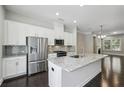 Well-appointed kitchen with granite countertops, stainless steel appliances, and a large island at 1829 Hislop Ln, Atlanta, GA 30345