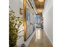 Bright hallway with polished concrete floors and modern art at 170 Boulevard Se, Atlanta, GA 30312