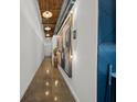 Hallway featuring industrial-style lighting and a modern art piece at 170 Boulevard Se, Atlanta, GA 30312