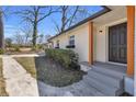 Close-up of the front entrance featuring a stylish black door and modern accents at 2917 Mcafee Rd, Decatur, GA 30032