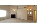 Bright living room features neutral colors, a fireplace, and large windows at 1956 Cutters Mill Way, Lithonia, GA 30058