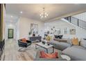 Spacious living room open to the modern kitchen, features a sleek design and comfortable seating at 2014 Cambridge Ave, Atlanta, GA 30337