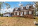 Charming two-story home with brick and siding and classic curb appeal at 4555 Cedar Heights Ct, Stone Mountain, GA 30083