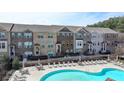 Community pool and lounge area offers an inviting space to relax and socialize at 656 Sunset Park Dr, Suwanee, GA 30024