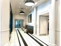 Stylish lobby with tiled floors, modern lighting, and comfortable seating area for residents and guests at 325 E Paces Ferry Ne Rd # 1606, Atlanta, GA 30305