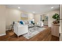 Bright living room with hardwood floors, neutral paint, and stylish furnishings, ideal for relaxation at 2519 Lauderdale Ne Dr, Atlanta, GA 30345