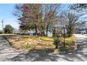 Residential street view showcasing a home with mature trees and neighborhood charm at 2519 Lauderdale Ne Dr, Atlanta, GA 30345