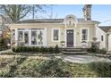 Charming home exterior with stone accents, manicured landscaping, and inviting front entrance at 1848 Flagler Ne Ave, Atlanta, GA 30309