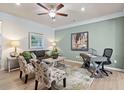 Cozy living room features a ceiling fan, modern decor and a comfortable seating area at 319 Skye Ln # 52, Cartersville, GA 30121