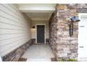 Inviting entryway with stone accents on the home's facade at 4902 Pleasantry Way, Acworth, GA 30101