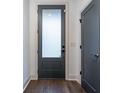 Interior view of a modern front door with privacy glass, leading into a stylish home at 77 Krog Ne St, Atlanta, GA 30307