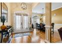 Inviting foyer with hardwood floors leads to the dining area and living space at 9620 Coastal Pointe Dr, Villa Rica, GA 30180