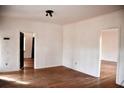 Bright living room with hardwood floors and neutral walls provides a blank canvas for personalization at 2642 Joyce Ave, Decatur, GA 30032