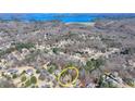 Areal view of neighborhood featuring lake access and beautiful homesites at 4260 River Club Dr, Cumming, GA 30041