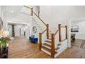 Stunning foyer with hardwood floors, staircase, and views to multiple rooms at 2039 Fisher Ne Trl, Atlanta, GA 30345