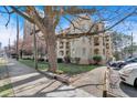 The complex features a sidewalk, mature trees, and convenient access to nearby streets and parking at 2855 Peachtree Ne Rd # 302, Atlanta, GA 30305