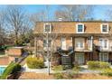 Charming townhouse with brick facade, landscaped grounds and inviting outdoor spaces at 1261 Lavista Ne Rd # E9, Atlanta, GA 30324