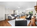 Inviting living space seamlessly connects living room, dining area, and kitchen, perfect for modern living at 7316 Caribou Trl, Riverdale, GA 30296