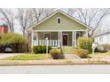 Inviting craftsman-style house with a well-kept lawn and a welcoming front porch at 338 Clifford Ne Ave, Atlanta, GA 30317