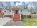 Charming home with a welcoming front porch, perfect for relaxing and enjoying the neighborhood at 16 Wadley Nw St, Atlanta, GA 30314