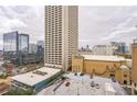 City view showing architecture, skyline and rooftops, on an overcast day at 620 Peachtree Ne St # 1413, Atlanta, GA 30308