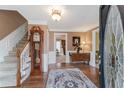 Inviting foyer with hardwood floors, staircase, and classic decor at 2205 Parliament Dr, Lawrenceville, GA 30043