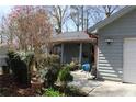 Charming one-story home featuring an attached garage and a well-maintained yard at 1302 Buttercup Ct, Lawrenceville, GA 30044