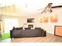Spacious living room with hardwood floors, a fireplace, and a large window at 755 Heritage Valley Rd, Norcross, GA 30093