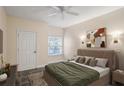 Inviting main bedroom with soft lighting, neutral colors, and tile flooring at 955 Juniper Ne St # 4125, Atlanta, GA 30309