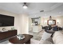 Open-concept living space with modern decor, adjoining kitchen and dining areas at 955 Juniper Ne St # 4125, Atlanta, GA 30309