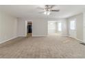 Bright living room with open floor plan, neutral colors, and access to other living spaces at 3127 Leyland Ct, Decatur, GA 30034