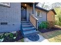 Inviting home entrance with freshly painted stairs and a stylish front door at 727 Cool Hollow Dr, Decatur, GA 30033