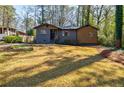 Well-maintained home featuring a lush lawn and welcoming exterior, perfect for curb appeal at 727 Cool Hollow Dr, Decatur, GA 30033