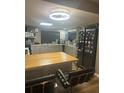 Bright kitchen featuring an island with breakfast bar seating and modern appliances at 123 Spring St, Stockbridge, GA 30281
