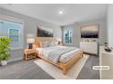 Serene main bedroom with plush carpet, natural light, and stylish decor at 3624 Silvery Way, Powder Springs, GA 30127