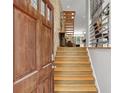 Inviting entryway features a light wood staircase and a striking view of the interior at 1323 Peachtree Ne Vw, Atlanta, GA 30319