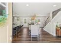 Open-concept dining area with hardwood floors, a large dining table and decor at 1521 Dianne Se Ct, Atlanta, GA 30316