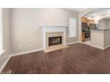 Living room featuring wood-look floors and a fireplace at 1477 Akridge Nw St, Atlanta, GA 30314