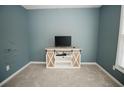 Cozy bedroom with fresh paint, new carpet, and a charming TV stand at 31 Wyngate Ct, Dallas, GA 30157