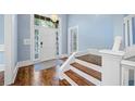 Inviting foyer with hardwood floors and staircase at 31 Greenland Trce, Atlanta, GA 30342