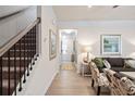 Bright living room with hardwood floors, stairway, and stylish decor at 315 Skye Ln # 50, Cartersville, GA 30121