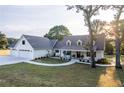 Beautiful single-story home featuring mature landscaping and a three-car garage at 770 Winding Creek Trl, Dacula, GA 30019