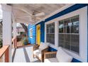 Inviting front porch with comfortable seating, a ceiling fan, and a view of the vibrant front yard at 674 Atlanta Se Ave, Atlanta, GA 30312