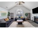 Spacious living room with modern flooring, fireplace and plentiful seating and decor at 3644 Gray Birch Dr, Decatur, GA 30034