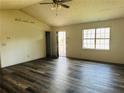Bright living room with hardwood floors, high ceilings, and natural light at 3170 Ashly Brooke Dr, Snellville, GA 30078