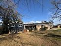 Charming two-story home features a combination of stone and siding exterior with a well-maintained front yard at 3633 Mill Glen Dr, Douglasville, GA 30135