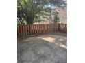 View of backyard and fence at 1110 Country Ct, Lawrenceville, GA 30044