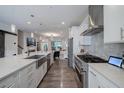 Bright kitchen features a large island, stainless steel appliances, and an open-concept design at 1049 Brandsford Nw St # 27-01, Atlanta, GA 30318