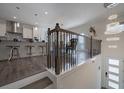 Modern interior showcases hardwood floors, open layout, and contemporary chandelier at 1049 Brandsford Nw St # 27-01, Atlanta, GA 30318